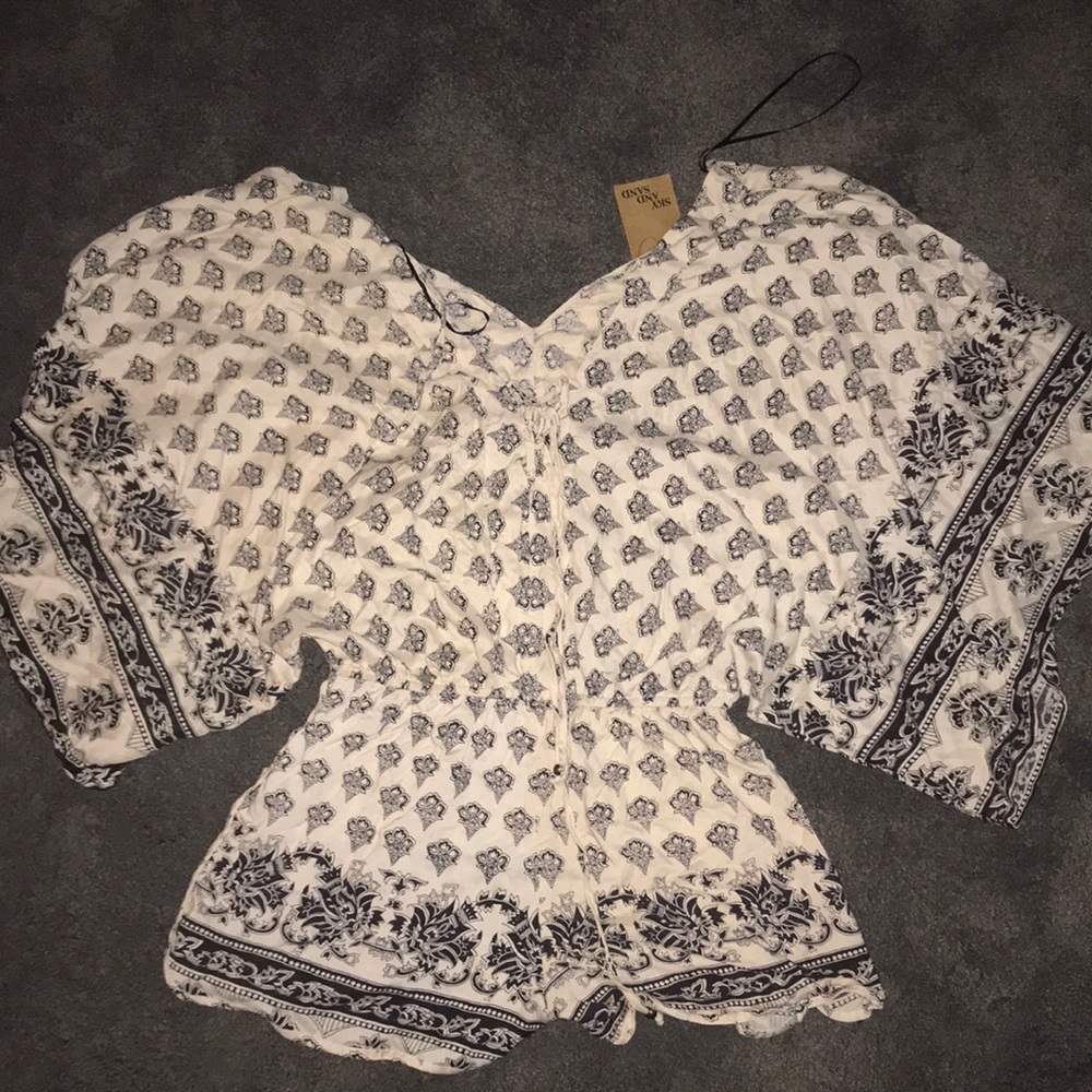 printed romper with billowy sleeves